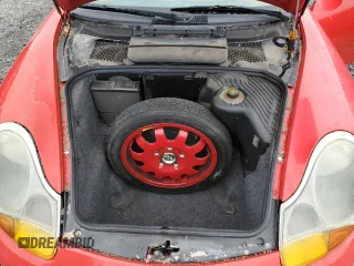 1999 Porsche Boxster z VIN WP0CA2981XU625007, wystawiony jako Copart lot #53751295 z przebiegiem 93 384 mil mil oraz Czysty tytuł • Clean title. Historia ofert i sprzedaży dostępna na DreamBid. Obrazek 11.