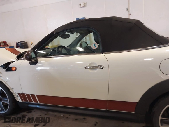 2013 MINI Roadster with VIN WMWSY1C52DT625564, listed as a IAAI auction lot 41442864 with 98,240 mi miles and . Bid and sale history available at DreamBid. Image 15.