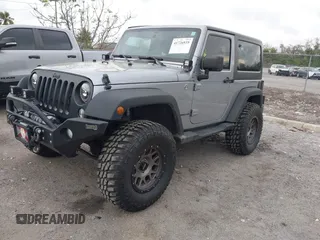 2014 Jeep Wrangler Sport with VIN 1C4AJWAG0EL265409, listed as a IAAI auction lot 41726935 with 78,547 mi miles and . Bid and sale history available at DreamBid. Image 2.
