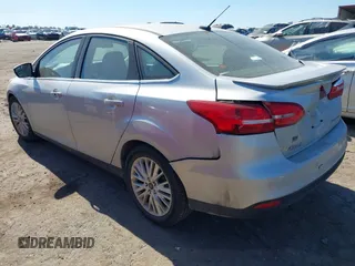 2017 Ford Focus Titanium с VIN 1FADP3J22HL230024, выставлен на аукционе IAAI как лот 41547566 с пробегом 146 969 миль миль и . История ставок и продаж доступна на DreamBid. Изображение 3.