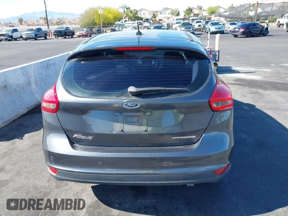 2017 Ford Focus Titanium with VIN 1FADP3N25HL299817, listed as a IAAI auction lot 42161440 with 154,974 mi miles and . Bid and sale history available at carsss.com. Image 16.