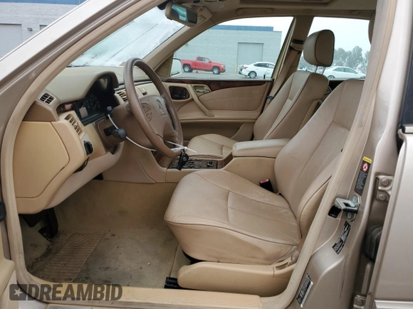 2002 Mercedes-Benz E-Class with VIN WDBJF65J92B404315, listed as a Copart auction lot 75481094 with 87,383 mi miles and Salvage Title. Bid and sale history available at carsss.com. Image 7.