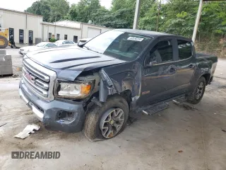 2015 GMC Canyon 4WD SLE with VIN 1GTG6BE38F1133409, listed as a Copart auction lot 64590355 with 196,234 mi miles and Salvage title. Bid and sale history available at DreamBid. Image 1.