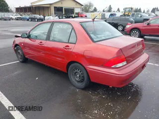 2003 Mitsubishi Lancer ES with VIN JA3AJ26E13U107196, listed as a IAAI auction lot 41745889 with 182,515 mi miles. Bid and sale history available at carsss.com. Image 3.