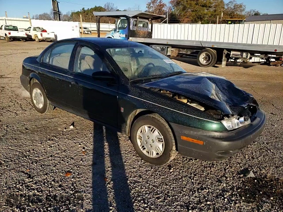 1997 Saturn SL z VIN 1G8ZH5285VZ122690, wystawiony jako Copart lot #81655244 z przebiegiem 159 048 mil mil oraz Szkoda całkowita • Salvage title. Historia ofert i sprzedaży dostępna na DreamBid. Obrazek 11.