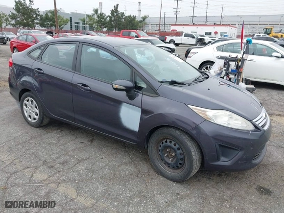 2013 Ford Fiesta SE with VIN 3FADP4BJ0DM199277, listed as a IAAI auction lot 42047833 with 142,739 mi miles. Bid and sale history available at carsss.com. Image 1.