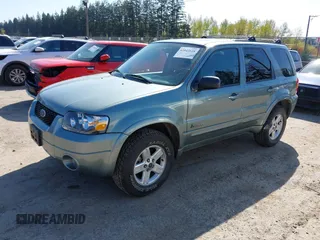 2006 Ford Escape Hybrid with VIN 1FMCU96H66KC08721, listed as a IAAI auction lot 42043128 with 58,394 mi miles and . Bid and sale history available at DreamBid. Image 2.
