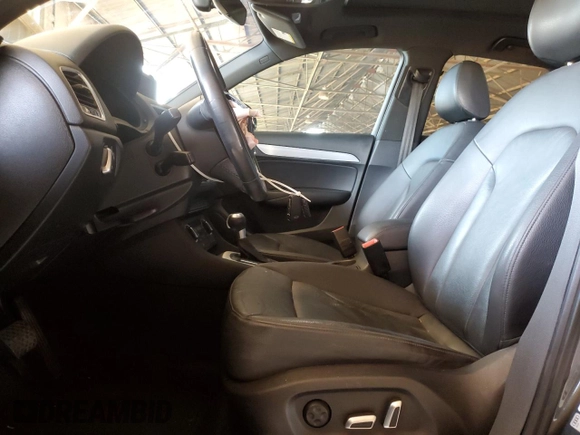 2018 Audi Q3 Premium with VIN WA1ECCFS8JR021306, listed as a Copart auction lot 60091415 with 100,604 mi miles and Salvage title. Bid and sale history available at DreamBid. Image 7.