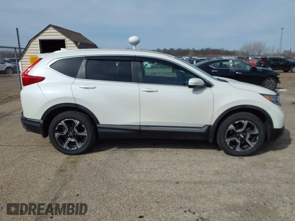 2017 Honda CR-V Touring with VIN 5J6RW2H95HL044505, listed as a IAAI auction lot 41856975 with 117,826 mi miles. Bid and sale history available at carsss.com. Image 13.