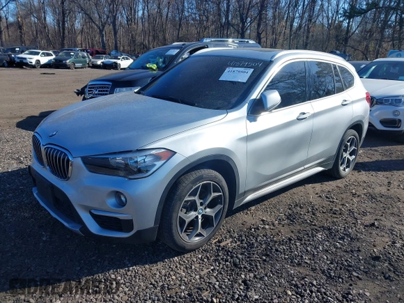 2018 BMW X1 xDrive28i with VIN WBXHT3C30J5L29757, listed as a IAAI auction lot 41879504 with 60,490 mi miles. Bid and sale history available at carsss.com. Image 2.