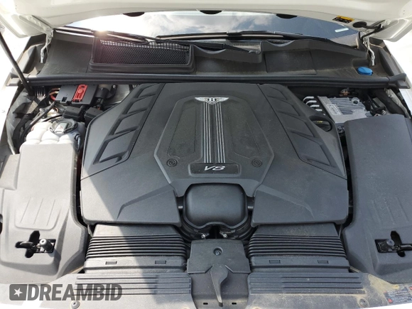2019 Bentley Bentayga V8 z VIN SJAAM2ZV0KC026362, wystawiony jako Copart lot #54059393 z przebiegiem 31 530 mil mil oraz . Historia ofert i sprzedaży dostępna na DreamBid. Obrazek 14.