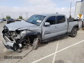 2020 Toyota Tacoma SR5 with VIN 3TMDZ5BN9LM096550, listed as a Copart auction lot 57323935 with 19,945 mi miles and Salvage title. Bid and sale history available at DreamBid. Image 1.