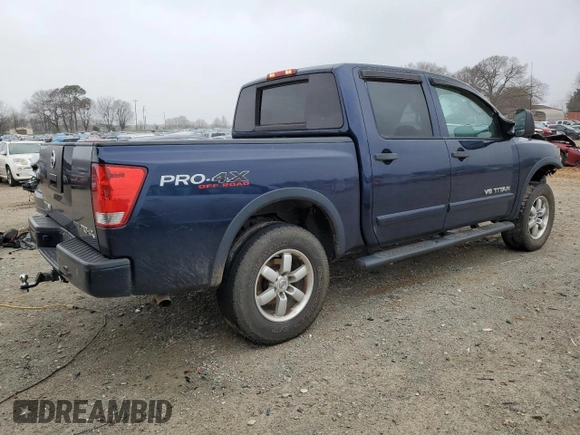 2011 Nissan Titan Pro-4X z VIN 1N6BA0EC0BN322228, wystawiony jako Copart lot #47617305 z przebiegiem 189 151 mil mil oraz Szkoda całkowita • Salvage title. Historia ofert i sprzedaży dostępna na DreamBid. Obrazek 3.