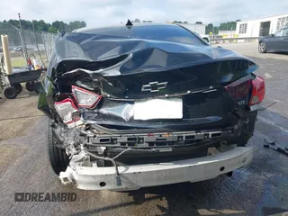 2014 Chevrolet Impala LTZ with VIN 2G1155S39E9102462, listed as a IAAI auction lot 42618513 with 121,943 mi miles and . Bid and sale history available at DreamBid. Image 6.