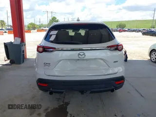 2016 Mazda CX-9 Grand Touring with VIN JM3TCADYXG0113563, listed as a IAAI auction lot 42593120 with 237,696 mi miles and . Bid and sale history available at DreamBid. Image 16.