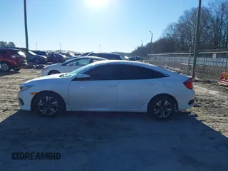 2017 Honda Civic LX z VIN 19XFC2F50HE007646, wystawiony jako IAAI lot #41360121 z przebiegiem 133 800 mil mil oraz . Historia ofert i sprzedaży dostępna na DreamBid. Obrazek 14.