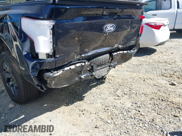 2024 Ford F-150 Lightning Flash with VIN 1FT6W3L75RWG30755, listed as a IAAI auction lot 41817158 with 1,932 mi miles and . Bid and sale history available at DreamBid. Image 6.