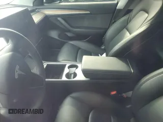 2023 Tesla Model 3 z VIN 5YJ3E1EA7PF573852, wystawiony jako Copart lot #57662565 z przebiegiem Nie podano mil oraz Szkoda całkowita • Salvage title. Historia ofert i sprzedaży dostępna na DreamBid. Obrazek 8.