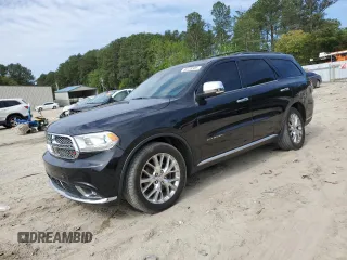 2014 Dodge Durango Citadel z VIN 1C4SDJET6EC267350, wystawiony jako Copart lot #56128585 z przebiegiem 259 339 mil mil oraz Szkoda całkowita • Salvage title. Historia ofert i sprzedaży dostępna na DreamBid. Obrazek 1.
