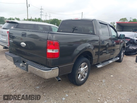 2006 Ford F-150 XLT with VIN 1FTRW12W96FA87318, listed as a IAAI auction lot 41936492 with 221,709 mi miles. Bid and sale history available at carsss.com. Image 4.