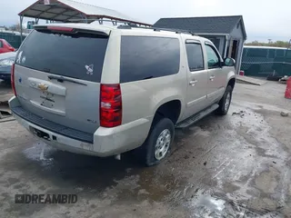2007 Chevrolet Suburban LT with VIN 3GNFK16387G267959, listed as a IAAI auction lot 41999489 with 106,131 mi miles. Bid and sale history available at carsss.com. Image 4.