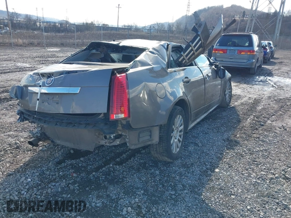 2012 Cadillac CTS Luxury z VIN 1G6DG5E53C0129159, wystawiony jako IAAI lot #41476575 z przebiegiem 97 676 mil mil oraz . Historia ofert i sprzedaży dostępna na DreamBid. Obrazek 4.