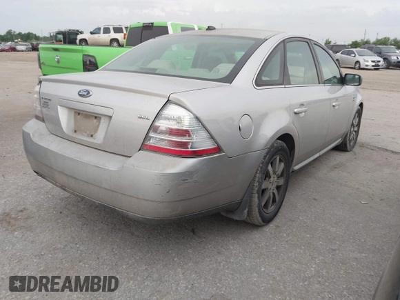 2008 Ford Taurus SEL z VIN 1FAHP24W78G174813, wystawiony jako IAAI lot #42482599 z przebiegiem 154 115 mil mil oraz . Historia ofert i sprzedaży dostępna na DreamBid. Obrazek 4.