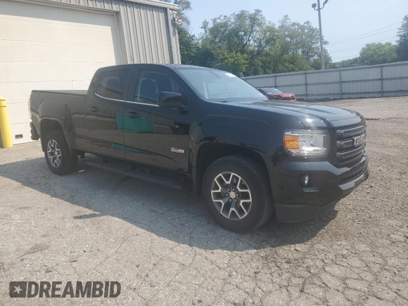 2018 GMC Canyon 4WD All Terrain w/Cloth with VIN 1GTG6CEN0J1301365, listed as a Copart auction lot 69886294 with 61,857 mi miles and Salvage Title. Bid and sale history available at carsss.com. Image 4.