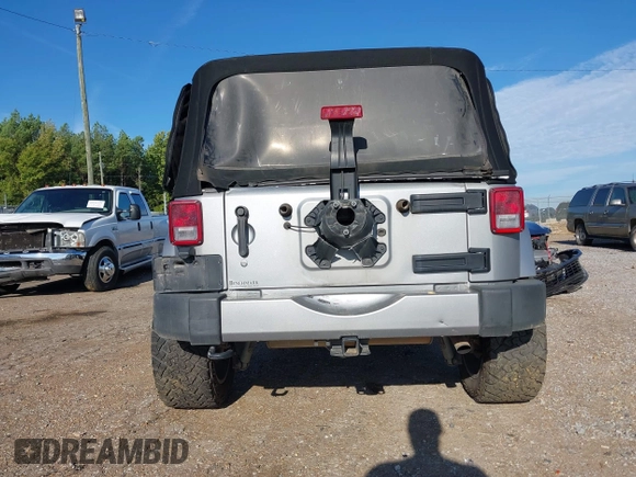 2016 Jeep Wrangler Sahara z VIN 1C4AJWBGXGL120329, wystawiony jako IAAI lot #40239916 z przebiegiem 96 731 mil mil oraz . Historia ofert i sprzedaży dostępna na DreamBid. Obrazek 16.