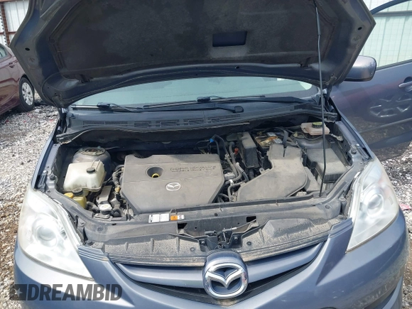2009 Mazda 5 Touring with VIN JM1CR29LX90333914, listed as a IAAI auction lot 42101304 with 129,470 mi miles. Bid and sale history available at carsss.com. Image 10.