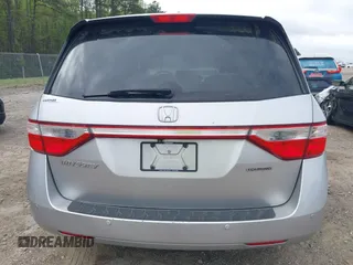 2012 Honda Odyssey Touring with VIN 5FNRL5H98CB026754, listed as a IAAI auction lot 41935562 with 165,626 mi miles. Bid and sale history available at carsss.com. Image 16.