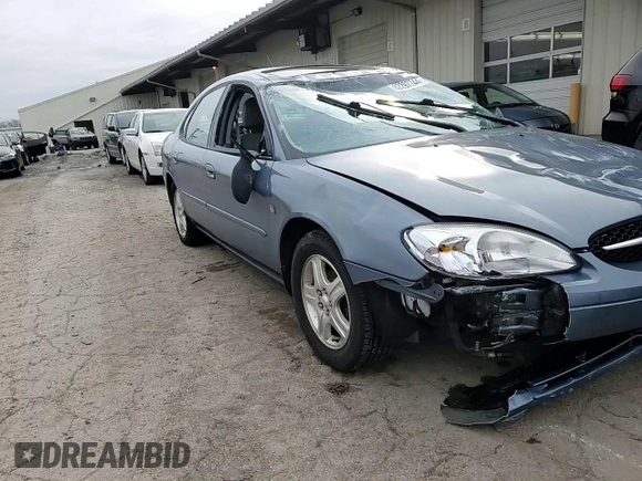 2000 Ford Taurus SEL with VIN 1FAFP56S2YG160062, listed as a Copart auction lot 82297744 with 97,218 mi miles and Salvage title. Bid and sale history available at DreamBid. Image 11.
