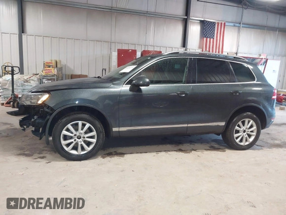 2013 Volkswagen Touareg Lux with VIN WVGEF9BP6DD007032, listed as a IAAI auction lot 41684721 with 147,249 mi miles and . Bid and sale history available at DreamBid. Image 15.