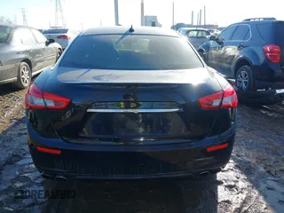2014 Maserati Ghibli z VIN ZAM57XSA4E1090315, wystawiony jako IAAI lot #41423507 z przebiegiem 115 323 mil mil oraz . Historia ofert i sprzedaży dostępna na DreamBid. Obrazek 17.