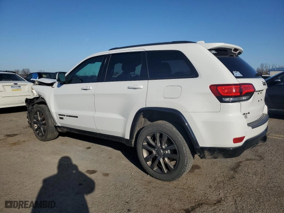 2016 Jeep Grand Cherokee Limited 75th Anniversary with VIN 1C4RJFBG5GC384433, listed as a Copart auction lot 49715105 with 102,182 mi miles and Salvage Title. Bid and sale history available at carsss.com. Image 2.