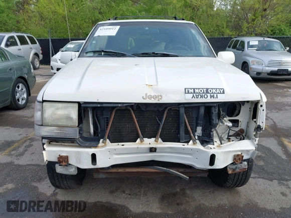 1998 Jeep Grand Cherokee Limited z VIN 1J4GZ78Y2WC164021, wystawiony jako IAAI lot #42109012 z przebiegiem Nie podano mil oraz . Historia ofert i sprzedaży dostępna na DreamBid. Obrazek 6.