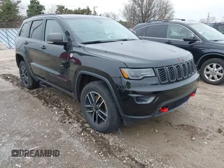 2019 Jeep Grand Cherokee Trailhawk with VIN 1C4RJFLT3KC554292, listed as a IAAI auction lot 41953049 with 31,672 mi miles and . Bid and sale history available at DreamBid. Image 1.