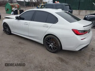 2020 BMW 3 Series M340i with VIN WBA5U7C0XLA232275, listed as a IAAI auction lot 41210369 with 56,220 mi miles and . Bid and sale history available at DreamBid. Image 3.