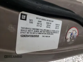 2003 Cadillac DeVille with VIN 1G6KD54Y03U206526, listed as a Copart auction lot 38023213 with 103,724 mi miles and Salvage Title. Bid and sale history available at carsss.com. Image 12.