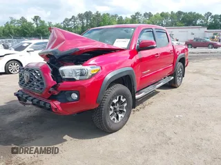 2021 Toyota Tacoma SR z VIN 5TFCZ5AN2MX263159, wystawiony jako IAAI lot #42273087 z przebiegiem 69 220 mil mil oraz . Historia ofert i sprzedaży dostępna na DreamBid. Obrazek 16.