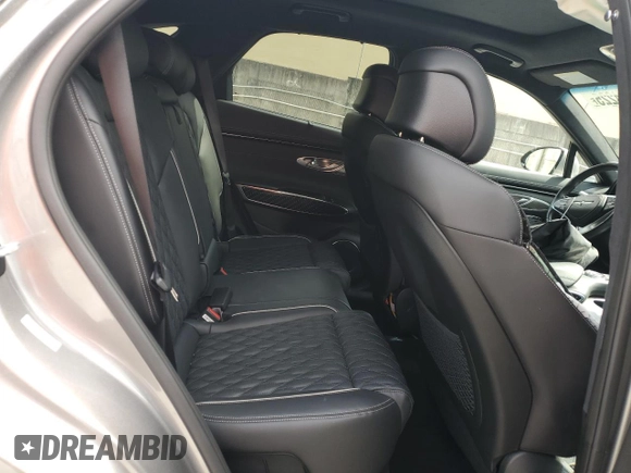 2023 Genesis GV70 Sport with VIN KMUMCDTC3PU098818, listed as a Copart auction lot 52884225 with 25,748 mi miles and Non Repairable. Bid and sale history available at DreamBid. Image 11.