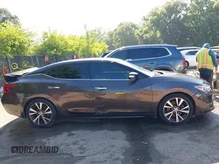 2016 Nissan Maxima Platinum z VIN 1N4AA6AP3GC385276, wystawiony jako IAAI lot #42547410 z przebiegiem 100 307 mil mil oraz . Historia ofert i sprzedaży dostępna na DreamBid. Obrazek 12.