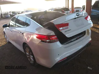 2016 Kia Optima EX with VIN 5XXGU4L30GG117411, listed as a IAAI auction lot 42034988 with 123,387 mi miles. Bid and sale history available at carsss.com. Image 3.