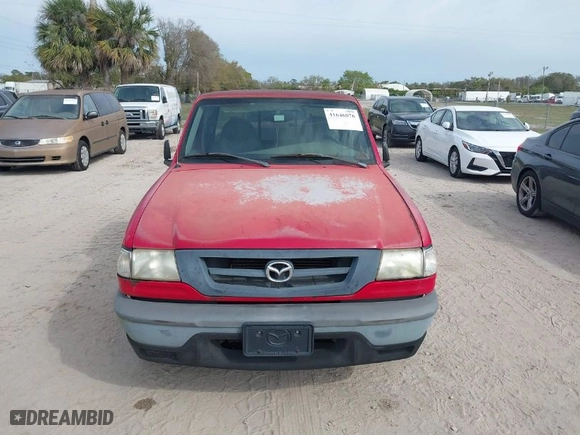 2002 Mazda B-Series 2WD Truck SX with VIN 4F4YR12D62TM23429, listed as a IAAI auction lot 41646076 with 97,360 mi miles. Bid and sale history available at carsss.com. Image 6.