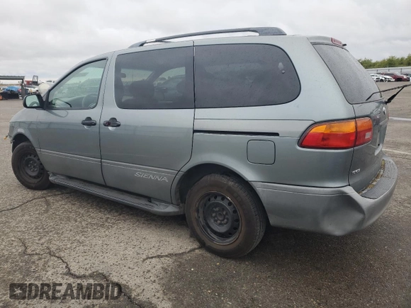 2000 Toyota Sienna LE with VIN 4T3ZF13C2YU217185, listed as a Copart auction lot 82407944 with 244,381 mi miles and Salvage Title. Bid and sale history available at DreamBid. Image 2.
