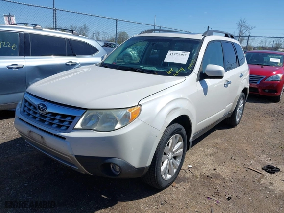 2011 Subaru Forester 2.5X Limited with VIN JF2SHBEC7BH778799, listed as a IAAI auction lot 41973395 with 216,944 mi miles. Bid and sale history available at carsss.com. Image 17.