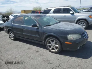 2002 Nissan Maxima GXE z VIN JN1DA31D62T404510, wystawiony jako Copart lot #51367005 z przebiegiem 185 156 mil mil oraz Czysty tytuł • Clean title. Historia ofert i sprzedaży dostępna na DreamBid. Obrazek 4.
