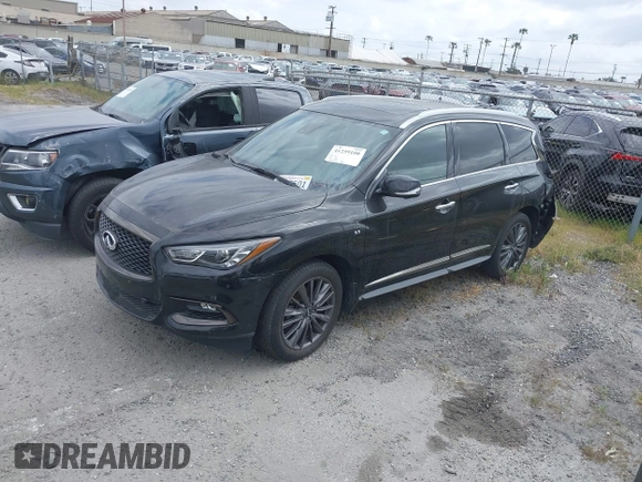 2020 Infiniti QX60 Pure with VIN 5N1DL0MN5LC525763, listed as a IAAI auction lot 41259100 with 38,995 mi miles and . Bid and sale history available at DreamBid. Image 2.