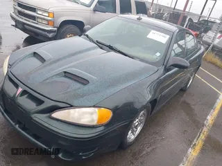 2003 Pontiac Grand Am GT1 with VIN 1G2NV52EX3C164442, listed as a IAAI auction lot 41772380 with 150,134 mi miles. Bid and sale history available at carsss.com. Image 2.