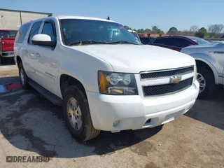 2009 Chevrolet Suburban LT w/2LT with VIN 1GNFC26089R273028, listed as a IAAI auction lot 41669345 with 244,869 mi miles. Bid and sale history available at carsss.com. Image 1.
